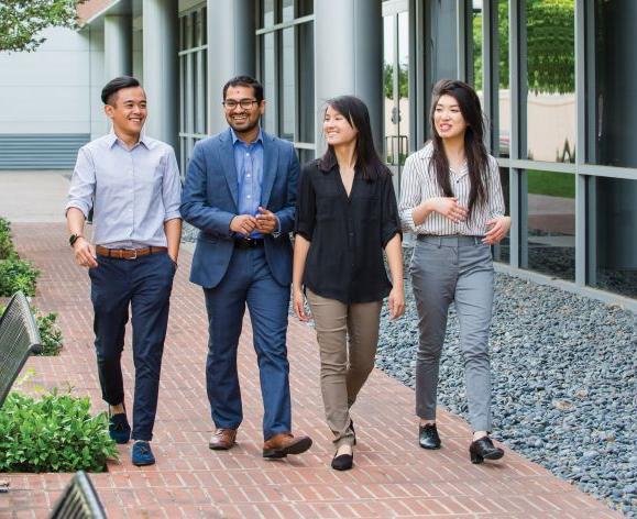 Sachin Shah walks with PharmD students on North Campus